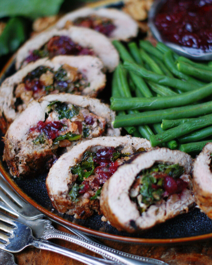 Cranberry Bacon Walnut Stuffed Pork Tenderloin with Collard Greens
