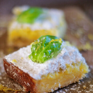 Old fashioned lemon squares with buttery shortbread crust and a fresh basil twist.
