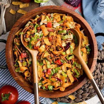 Catalina Taco Salad with Fritos, Ranch Style Pinto Beans, beef taco meat and homemade Catalina Dressing.