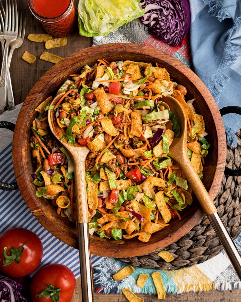 Catalina Taco Salad with Fritos, Ranch Style Pinto Beans, beef taco meat and homemade Catalina Dressing.
