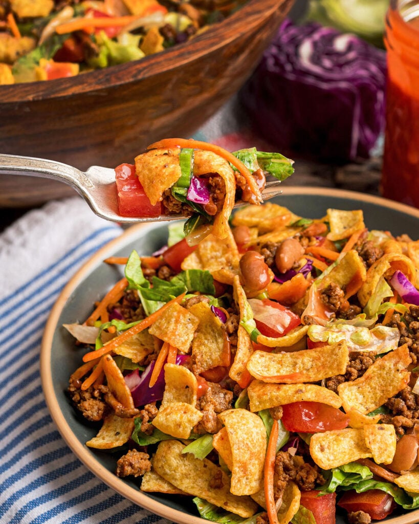 A bite of Catalina taco Salad on a fork to show the ingredients and texture.