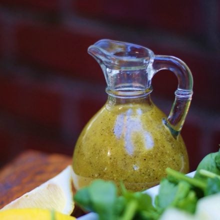 Melon Salad dressing in a glass bottle.