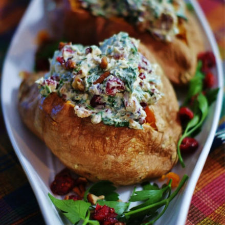 2 Stuffed sweet potatoes on a white dish