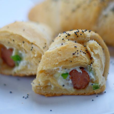 Upclose of cut open Hawaiian Popper Crescent Roll