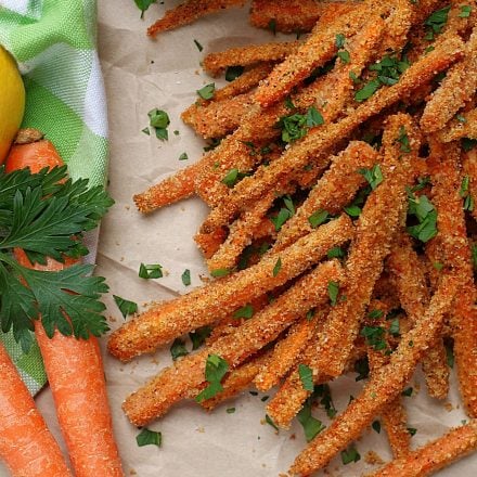 Crispy Garlic Parmesan Garlic Fries topped with parsley.