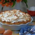 Side view of Old fashioned Coconut Pie with a high browned meringue