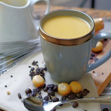 A steaming cup of coffee with Butterscotch Coffee Creamer.