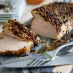 3 slices of peppered pork tenderloin cut from the whole tenderloin.