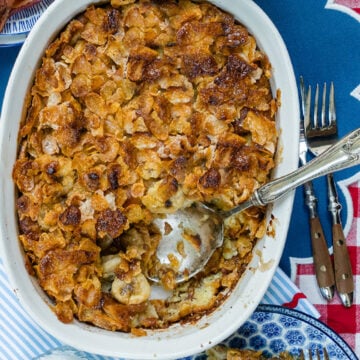 Looking down on a baked Banana French Toast Casserole with Frosted Flakes topping to show how it becomes golden brown when done.