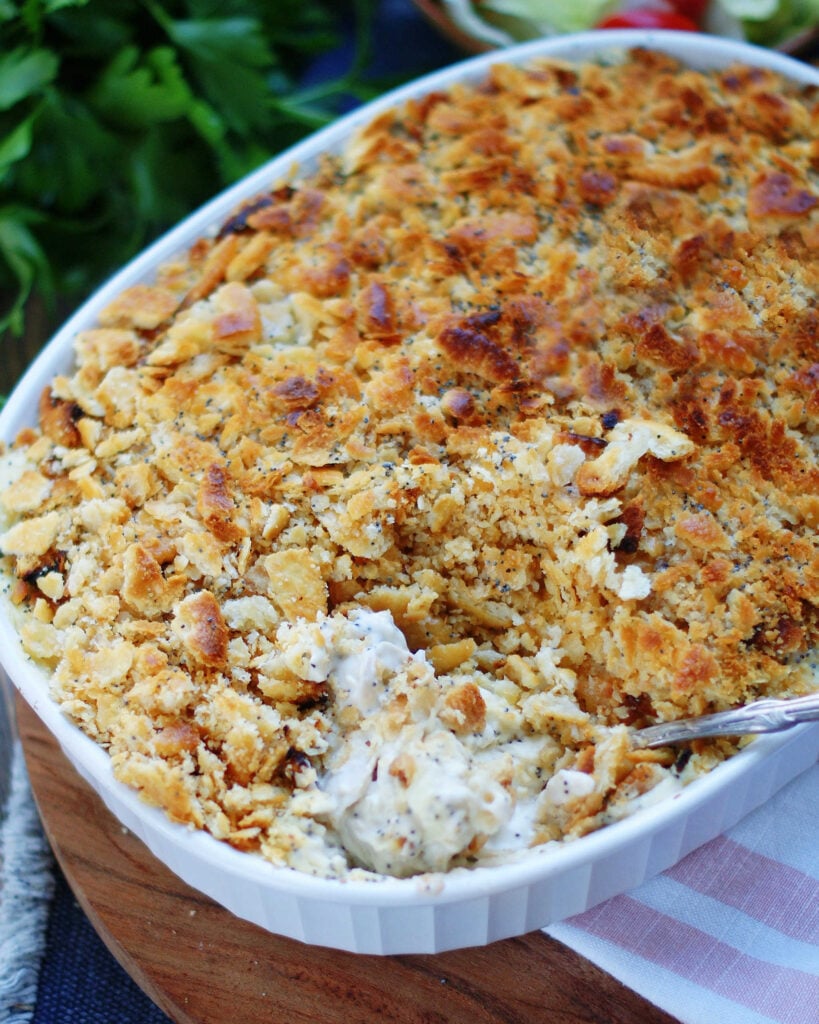 southern poppy seed chicken with a ritz cracker topping