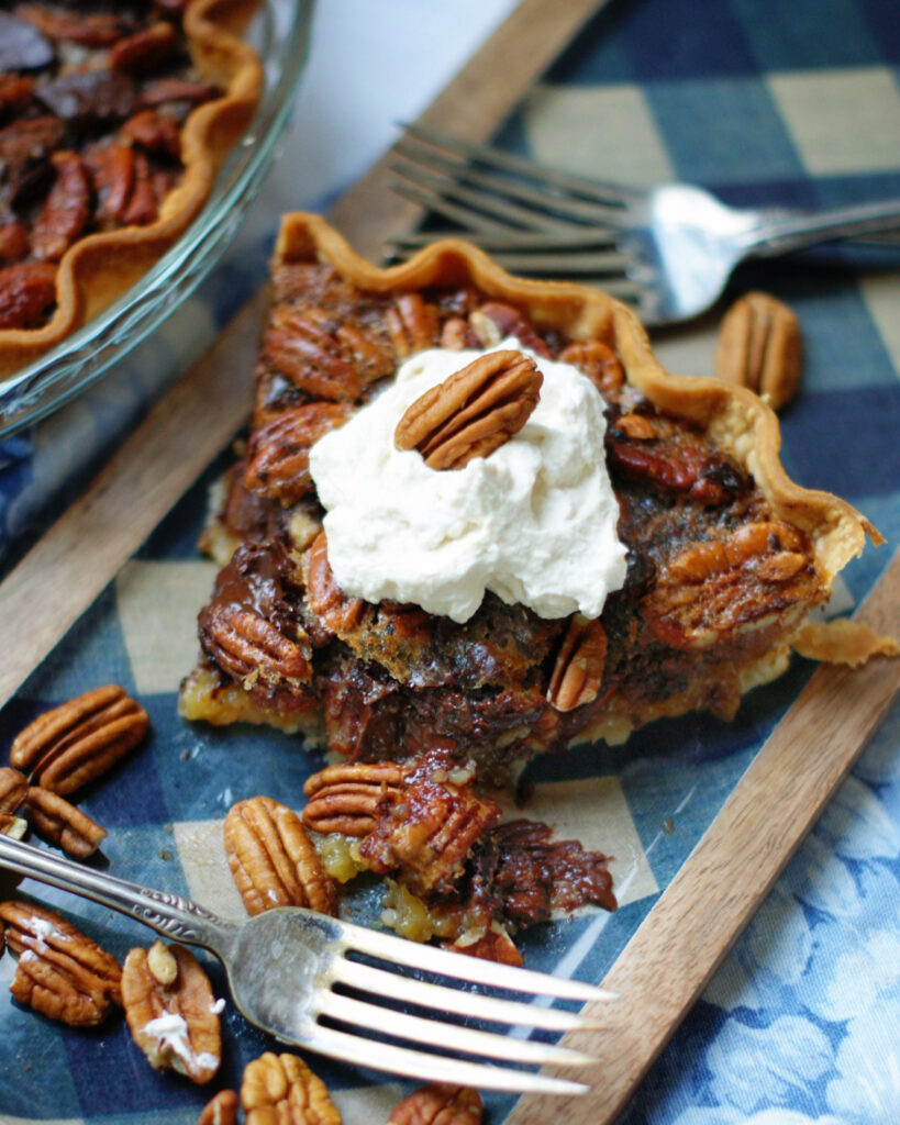 Bourbon Chocolate Pecan Pie with Molasses Bourbon Whipped Cream