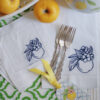 Embroidered tea towels and linen cocktail napkins with a hemstitch.