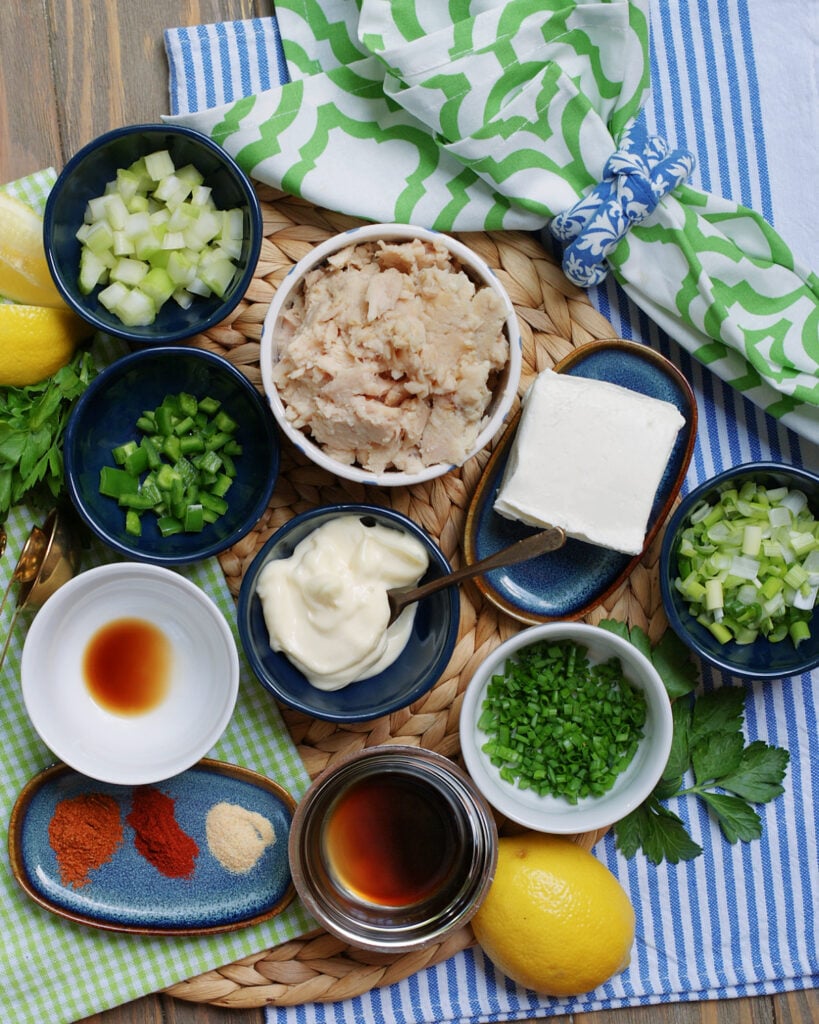 Smoked Tuna Dip ingredients including store bought tuna, cream cheese and creole seasoning.