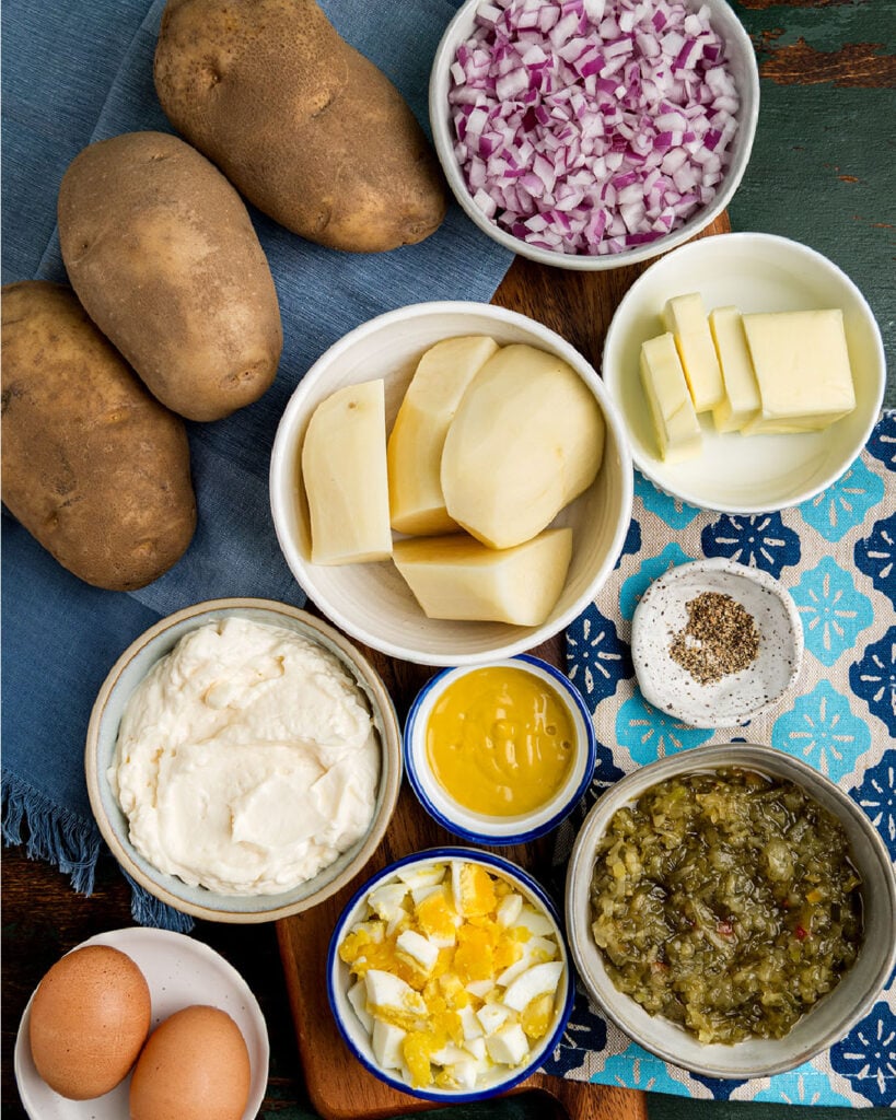 Ingredients for deviled egg potato salad measured and shown to give a visual of what is needed to make this cookout side dish.