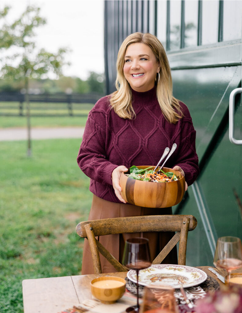 Stacey serving a Southern Thanksgiving dinner.